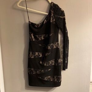 one long sleeve, black “RubyRox” dress